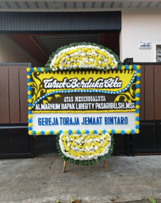 Papan Bunga Duka di Wutpaga